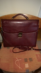Briefcase,   leather. Dark brown.  Texier brand. 